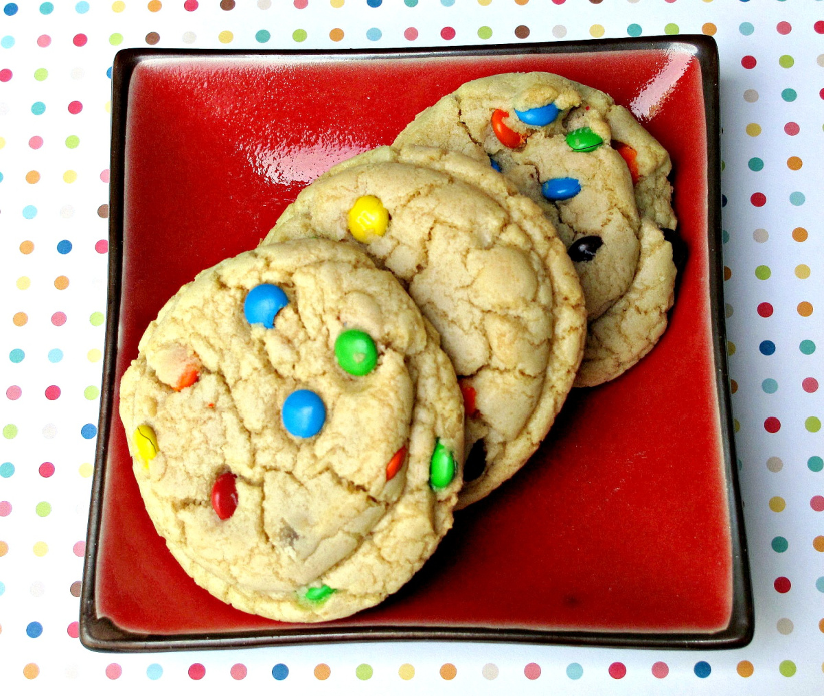 M and M cookies with a crackled top and mini m and m candies.