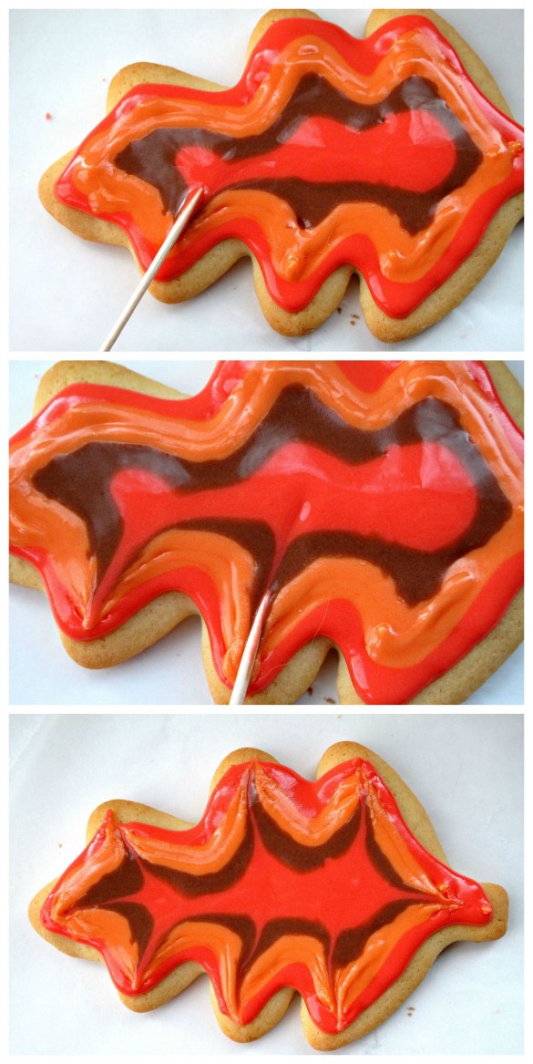 Using a toothpick to swirl the icing on the Decorated Thanksgiving Sugar Cookies