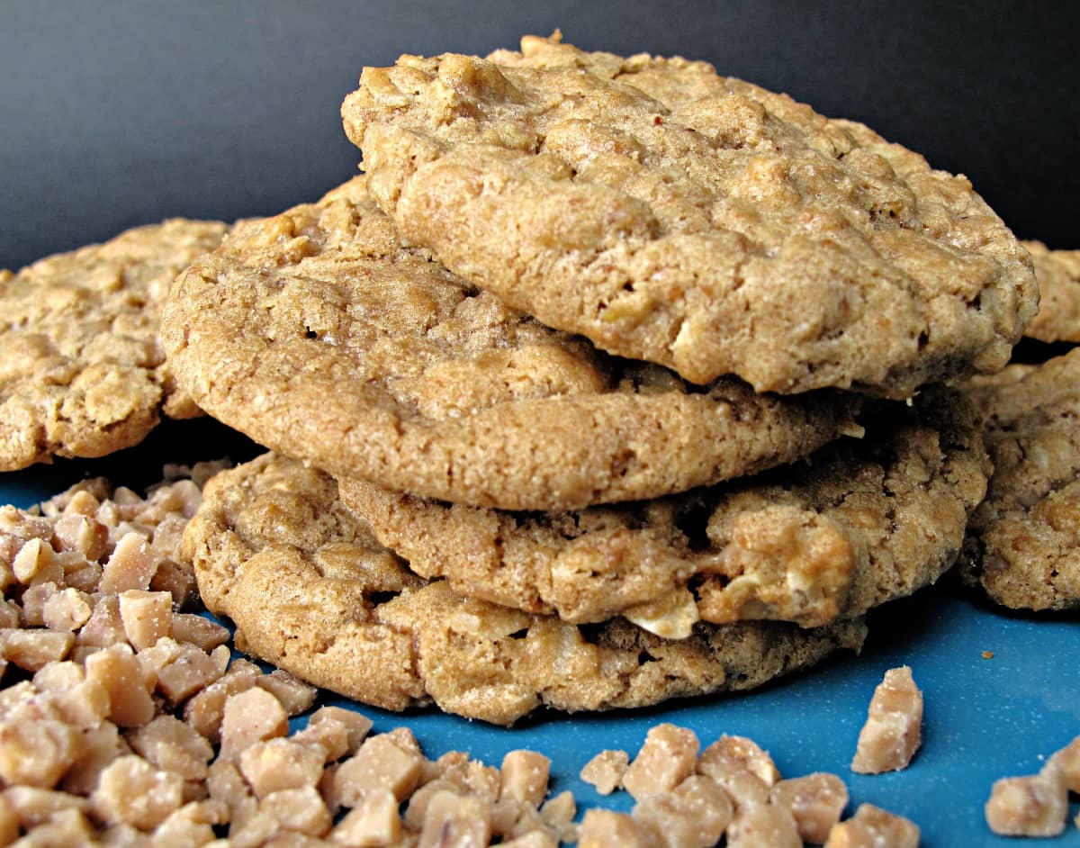 Stacked Biscoff Oatmeal Toffee Crunch Cookies with toffee bits.