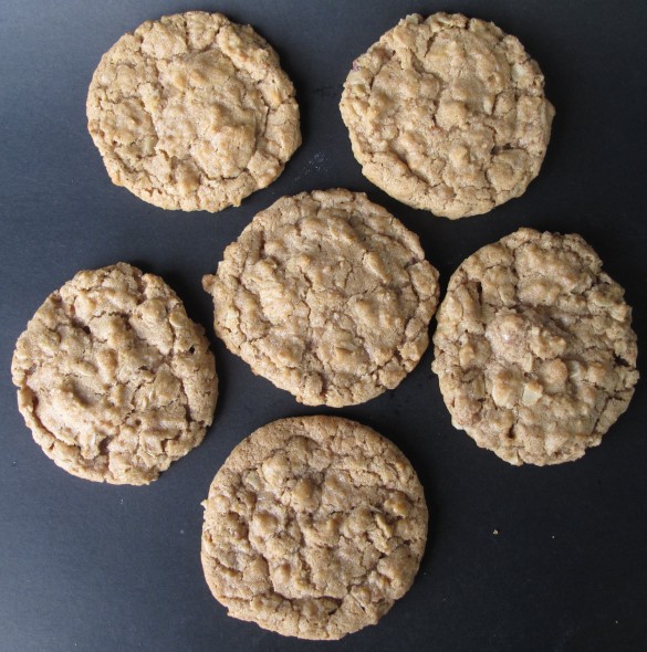 6 cookies on a black background.