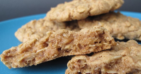 Inside of cookie showing oats and caramel colored dough.