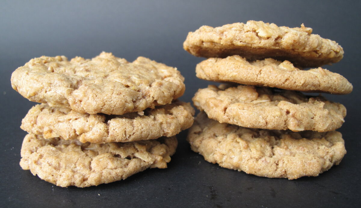 2 stacks of cookies on a black background.