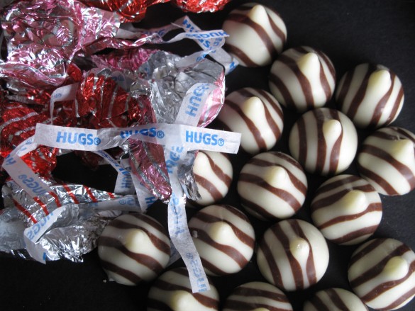Striped chocolate kiss candy unwrapped.