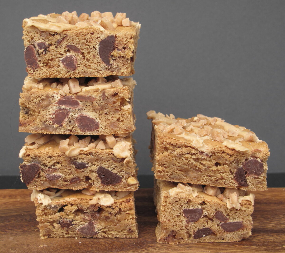 Two stacks of Biscoff Toffee Crunch Bars filled with chocolate chips.