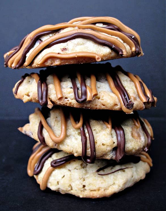 Stack of cookies showing thin crispy edge and chewy domed centers.