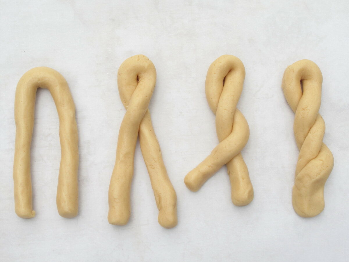 Instructions twisting the cookie dough: upsidedown "u", right over left for two twists.