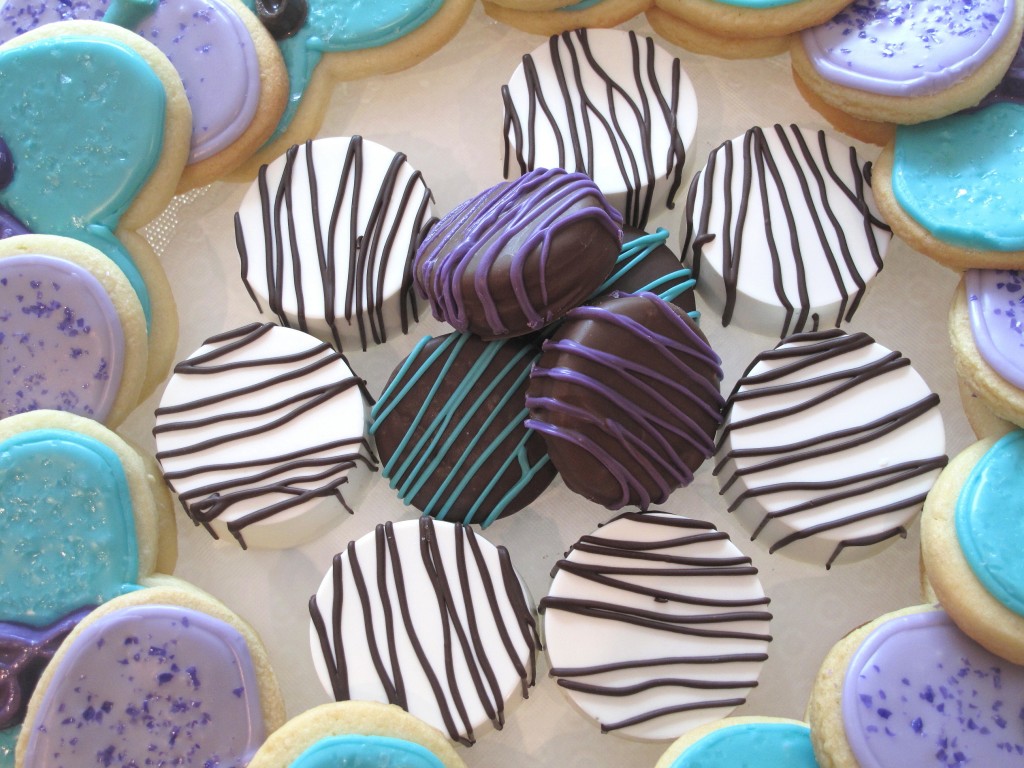 Chocolate covered oreos on a party platter.