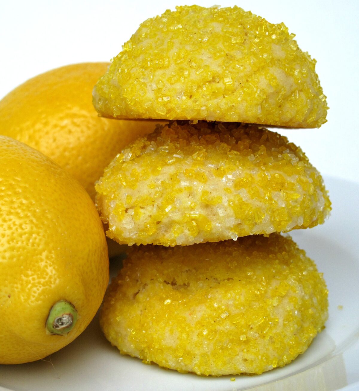 Stack of domed lemon cookies.