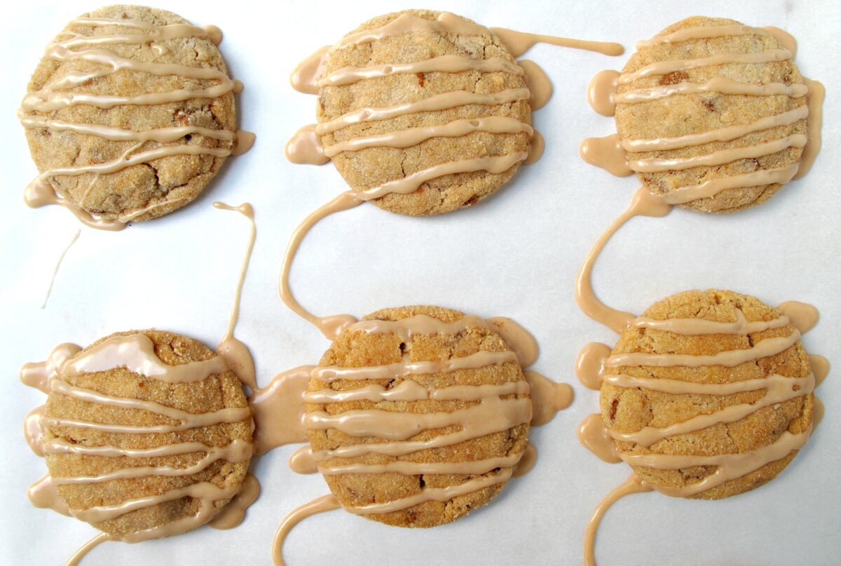 Six Oat Flour Cookies drizzled with icing.