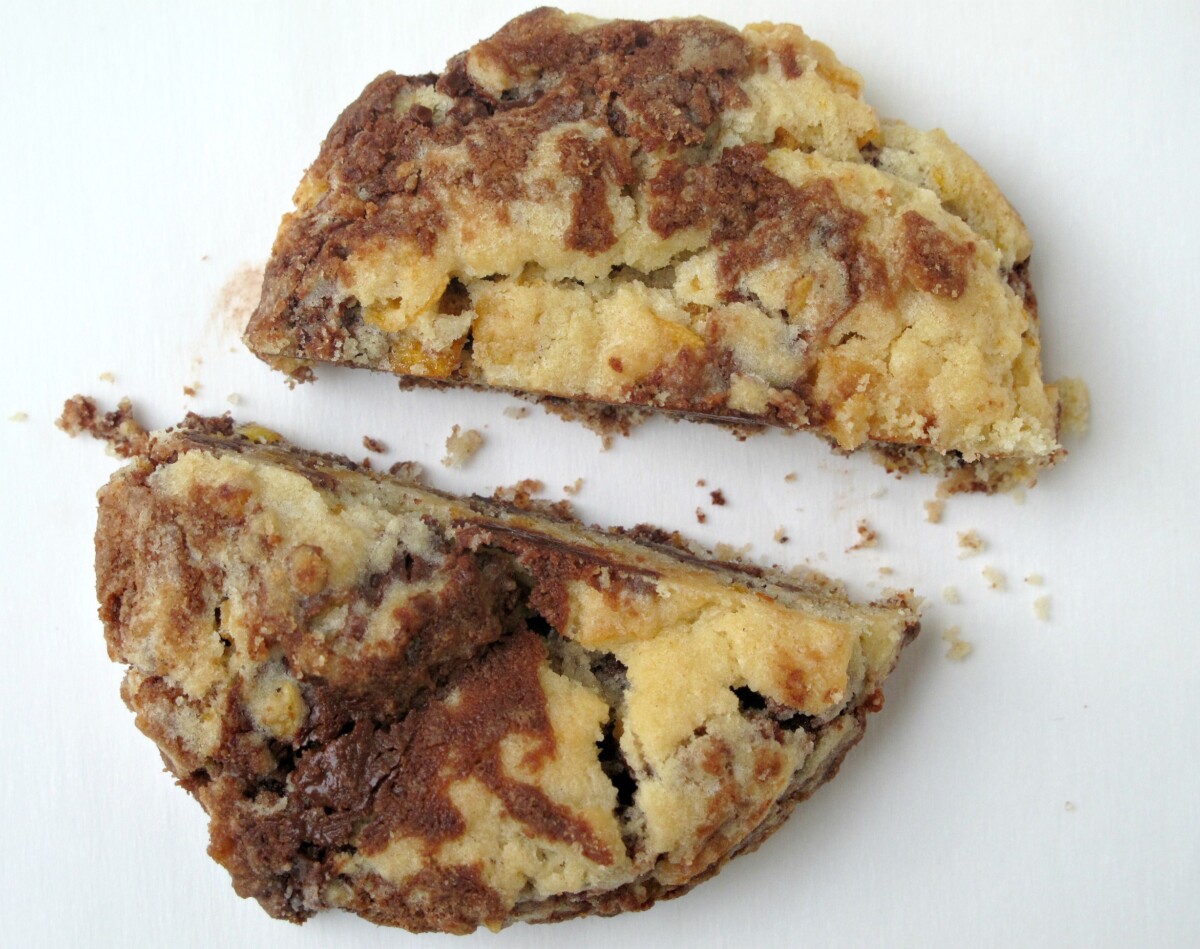Chocolate-vanilla cookie cut in half.