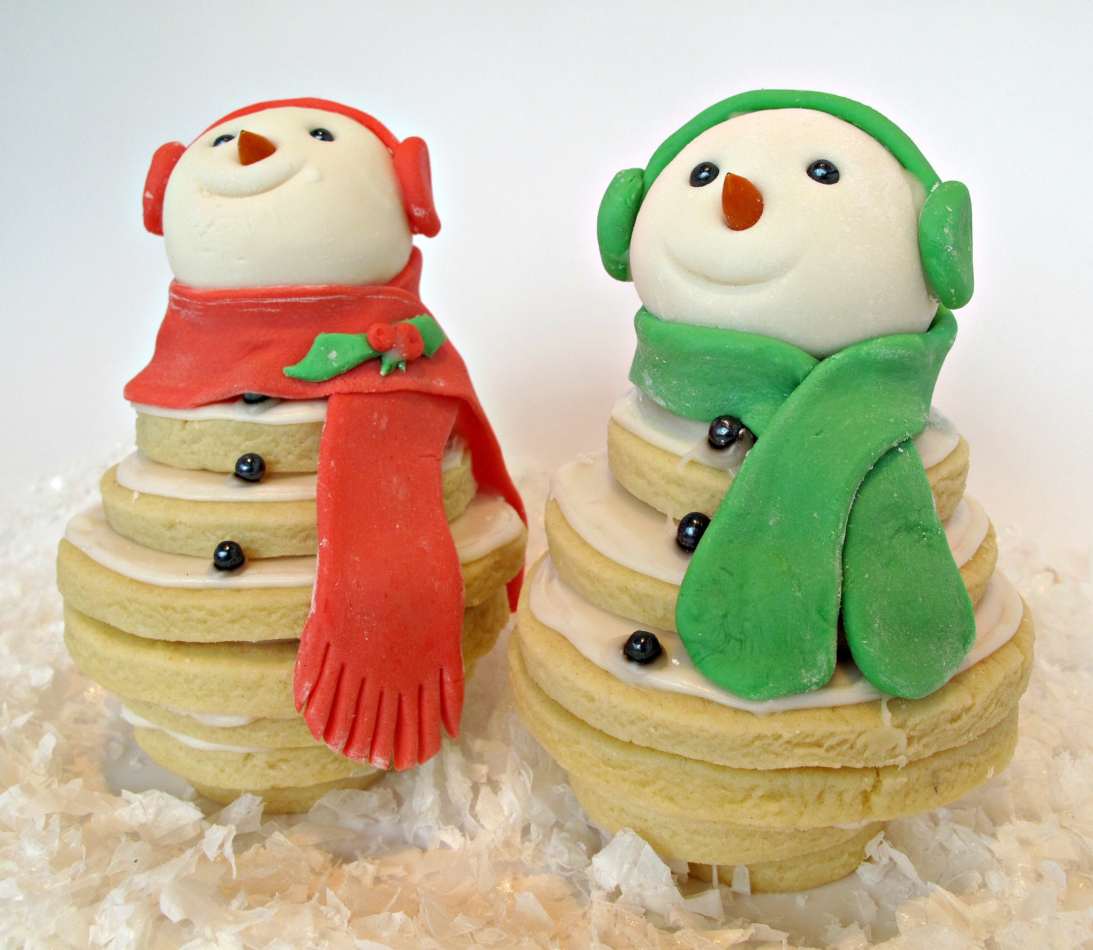 Closeup of stacked decorated cookies.