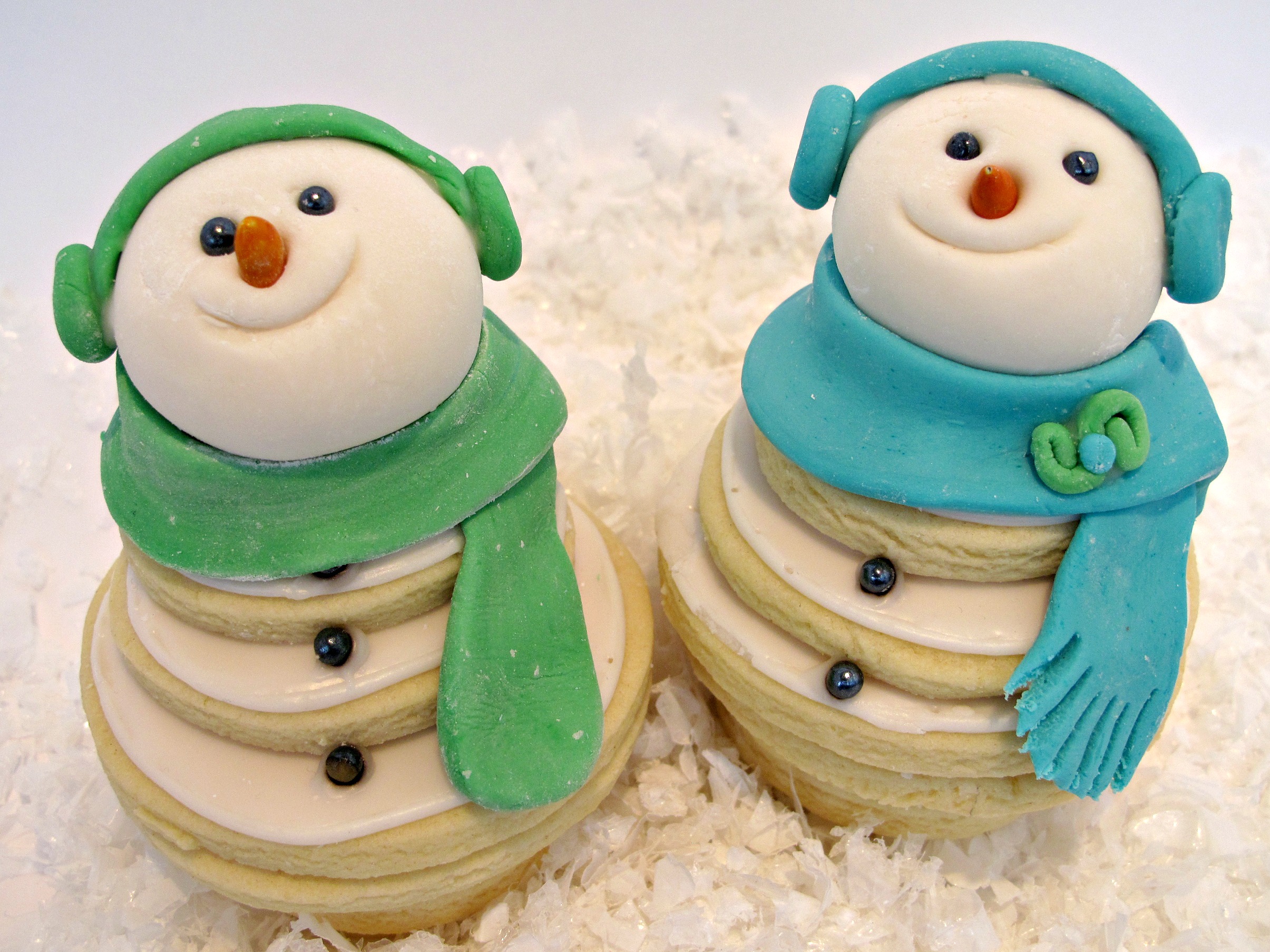 Cookie stacks decorated with fondant details.