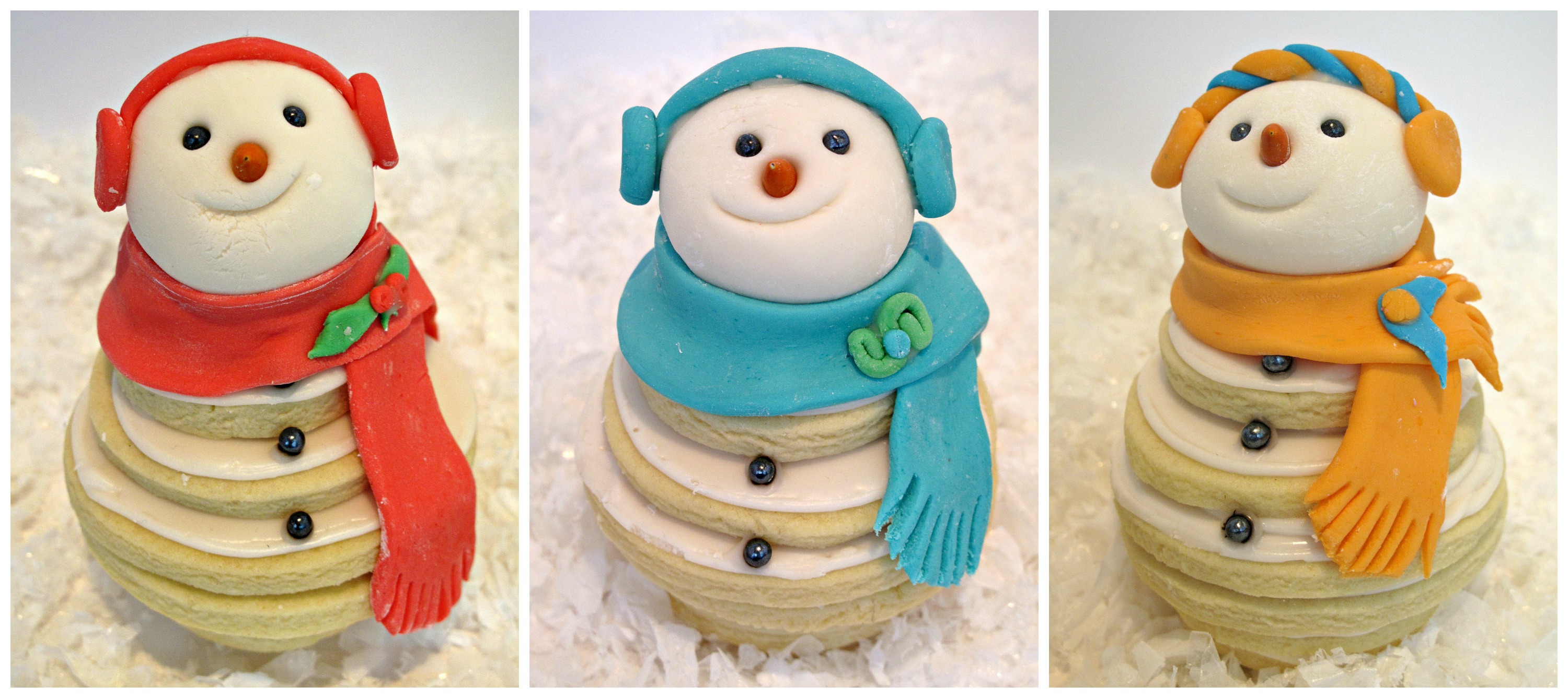 Three cookie snowment with different colors of decorations.