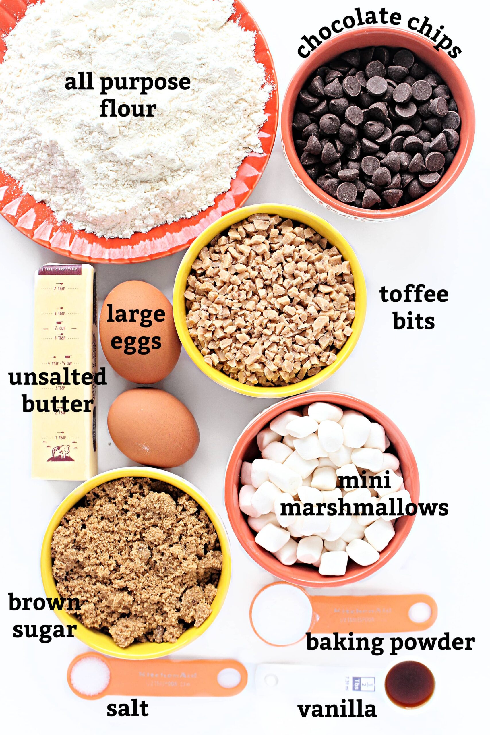 Ingredients: flour, butter, eggs, chocolate chips, toffee bits, mini marshmallows, brown sugar, salt, baking powder, vanilla.