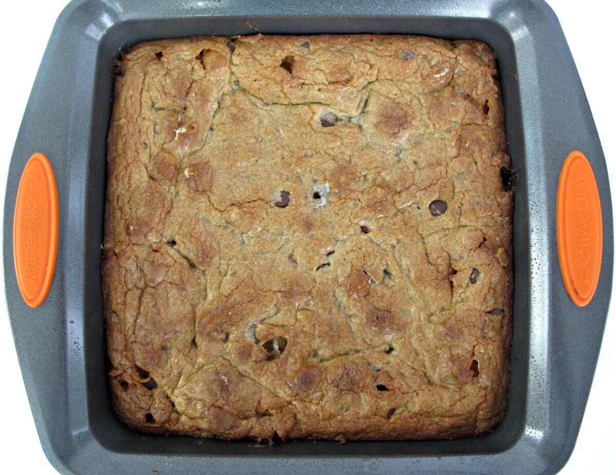 Chocolate Chip Cookie Bars in square baking pan.