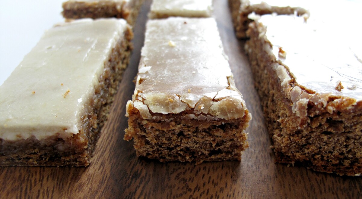 Closeup of three iced Lebkuchen bars.