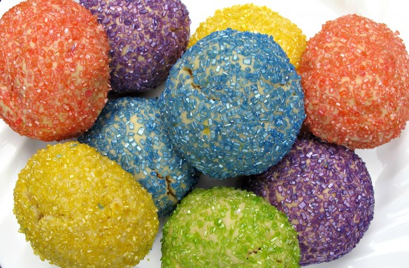 Balloon Cookies are round lemon cookies each coated with a different color of decorative sugar; blue, red, yellow, green.
