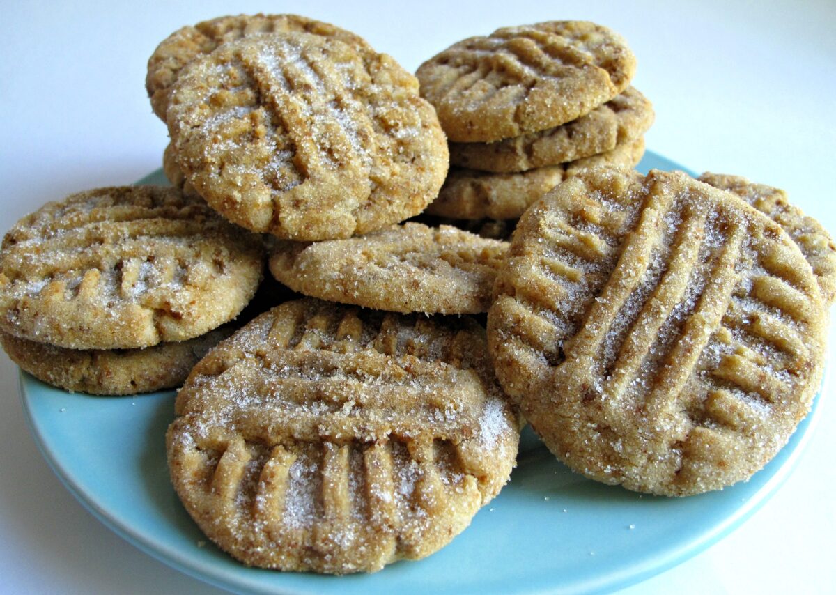 Cinnamon Divinity Cookies with a criss cross fork design on top. 