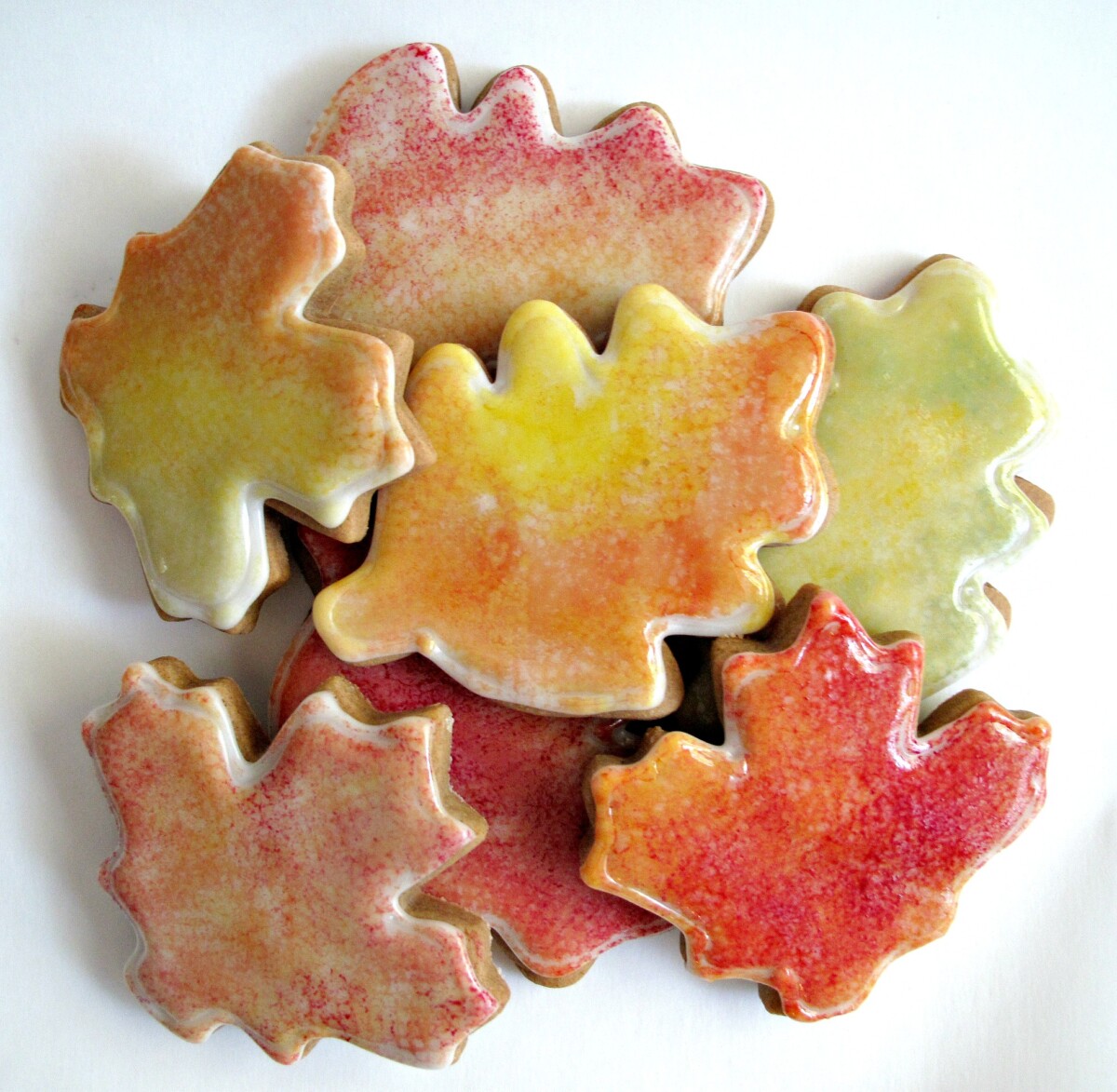Decorated Gingerbread Fall Leaves Cookies in a pile.