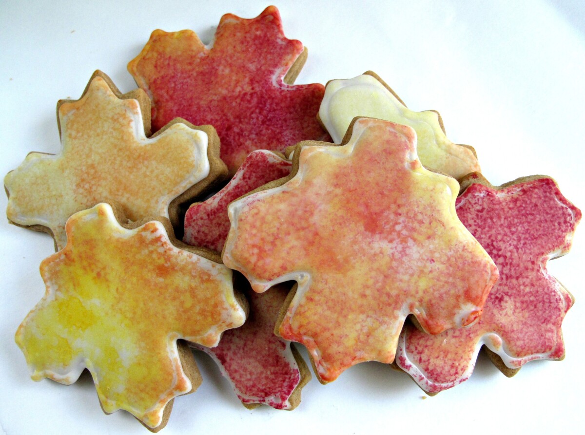 Decorated Fall Leaves Cookies in a pile.
