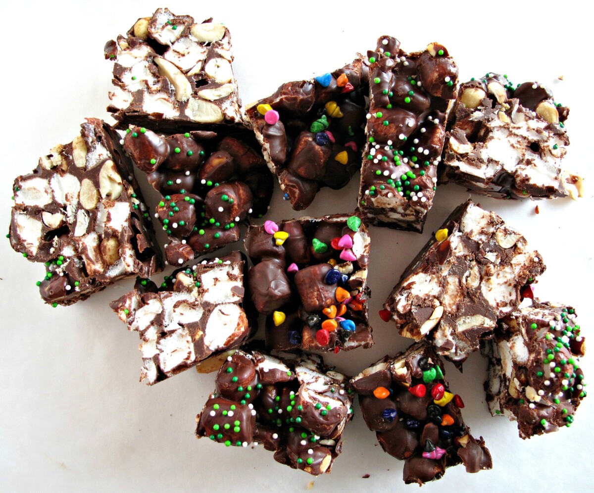  Candy cut into chuncks showing sprinkles on top and marshmallows inside.