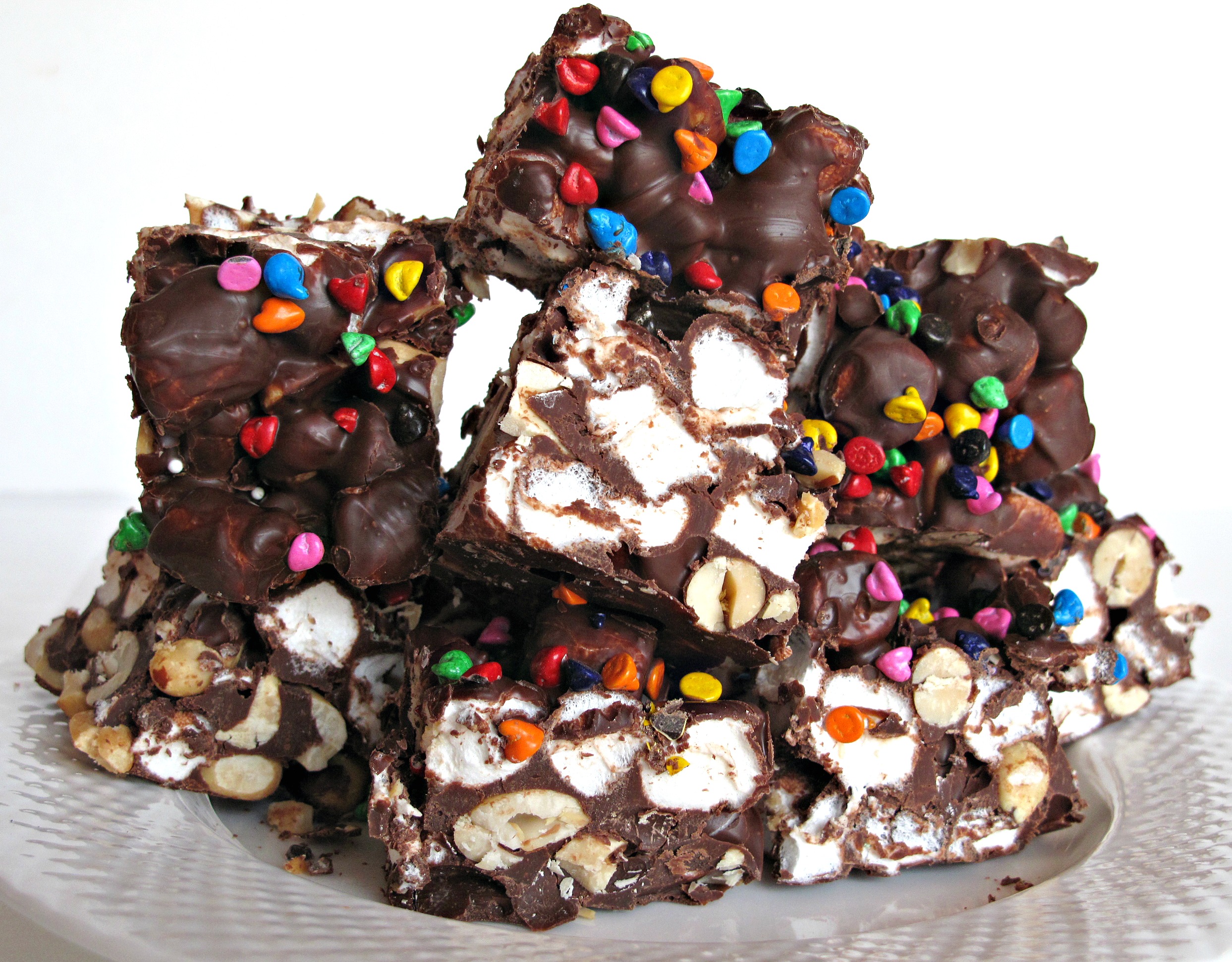 Rainbow's End Rocky Road Candy chunks showing interior marshmallows and peanuts surrounded by chocolate.