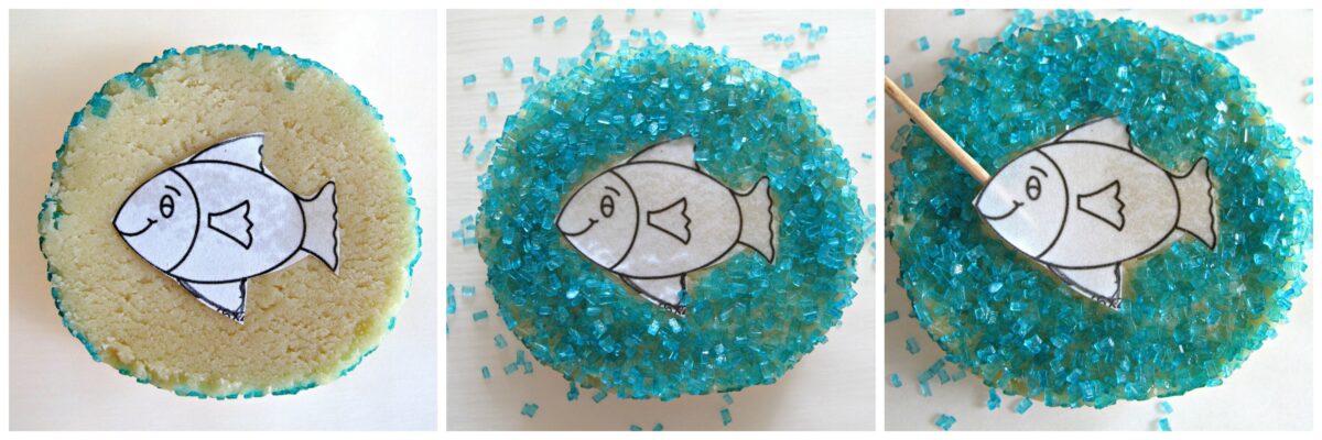 Stenciling instructions: fish stencil on cookie, coat with blue sugar, remove fish stencil with toothpick.