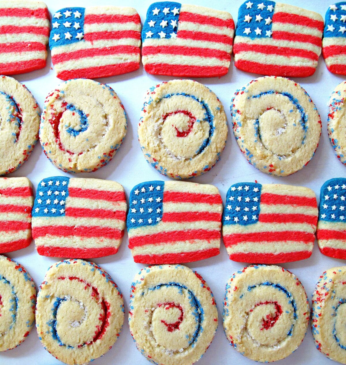 Flag cookies and spiral sparkler cookies in red, white, and blue.