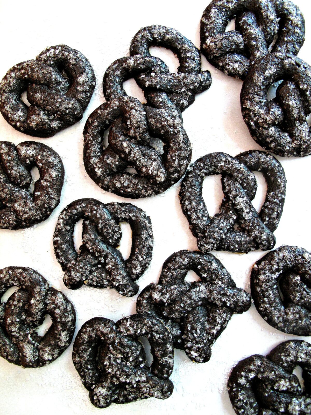 Chocolate Pretzel  shaped cookies coated in coarse sugar for crunch.