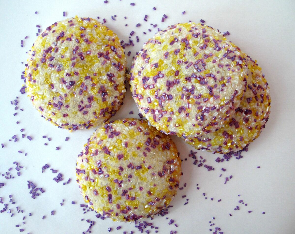Lavender Lemon Sugar Cookies coated in purple and yellow decorating sugar.