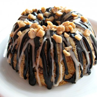 Vanilla Bean Mini-Bundt Cakes with Chocolate-Toffee Crunch- fluffy vanilla bean cake and a crunchy chocolate-toffee filling under a double drizzle of chocolate and vanilla icing. | The Monday Box