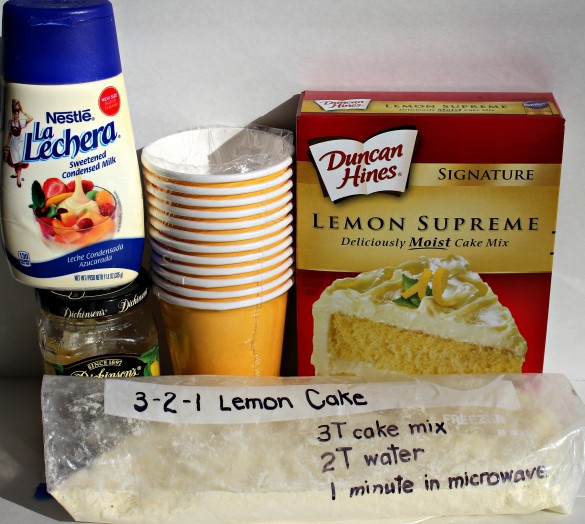 3-2-1 Lemon Poke Cake: Fluffy lemon cake topped with sweet, creamy condensed milk that seeps through poked holes, moistening and flavoring from top to bottom! A magic microwave mug cake ready to eat in 1 minute! | The Monday Box