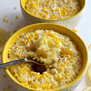 3-2-1 Lemon Poke Cake: Fluffy lemon cake topped with sweet, creamy condensed milk that seeps through poked holes, moistening and flavoring from top to bottom! A magic microwave mug cake ready to eat in 1 minute! | The Monday Box