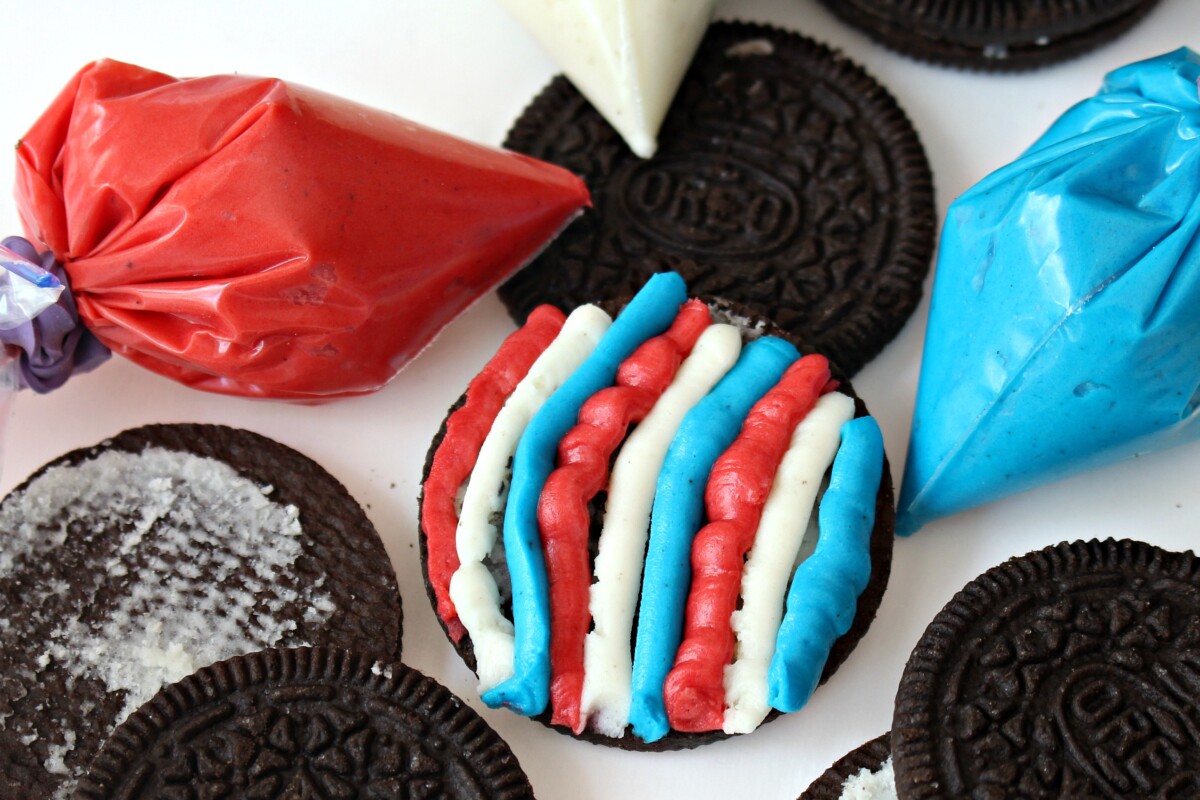 Oreo filling,colored, red, white and blue, piped in alternating colored stripes back into the Oreo cookies