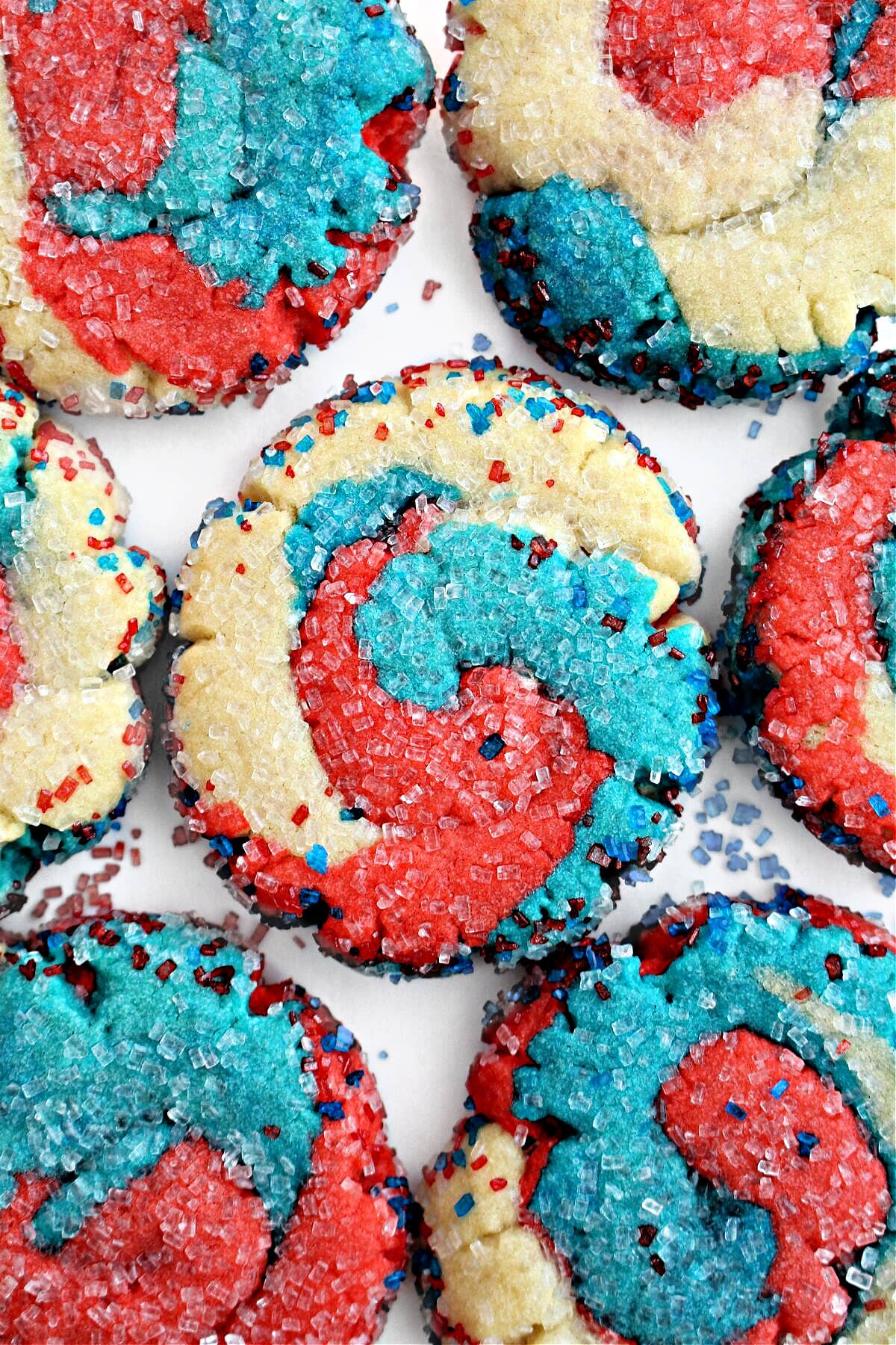 Fireworks Sugar Cookies swirled with red, white, and blue colored dough and sugar.