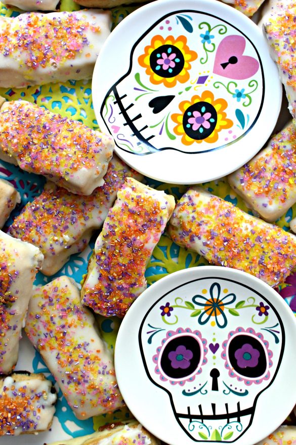 Day of the Dead Crafts and Activities for Kids featured by top Seattle lifestyle blogger, Marcie in Mommyland: Pabassinas, iced raisin-nut cookies with anise and citrus flavor, are a sweet part of many Dia de los Muertos celebrations.