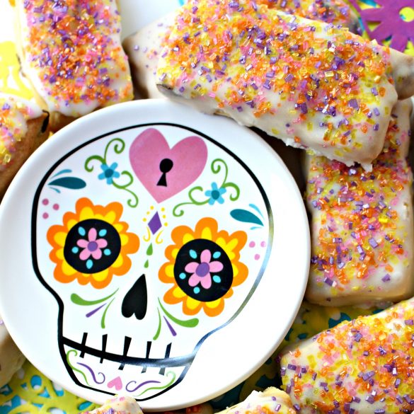 Pabassinas, iced raisin-nut cookies with anise and citrus flavor, are a sweet part of many Dia de los Muertos celebrations.