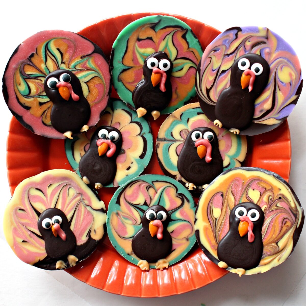 Decorated Chocolate Bark Turkeys on a serving plate.