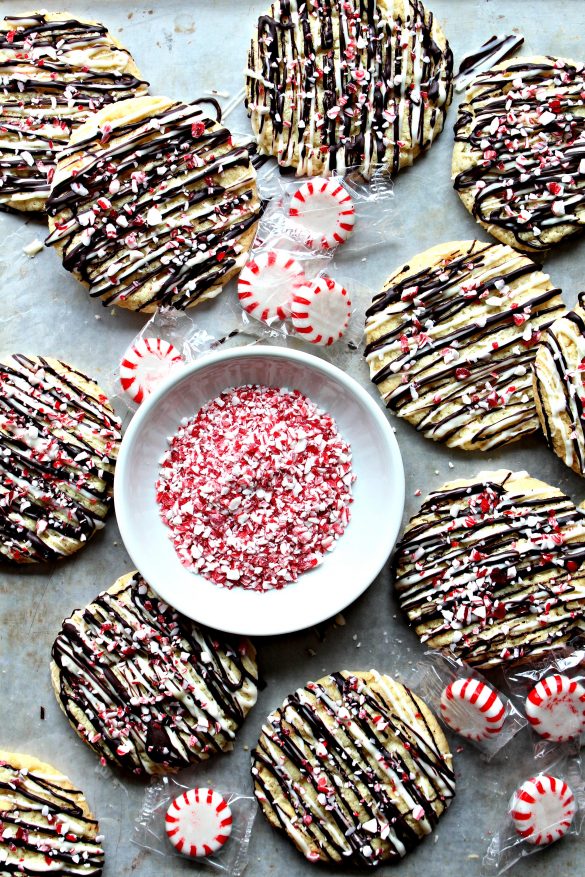 Peppermint Crunch Cookies and a bowl of red and white peppermint candy crushed into bits for decorating the tops of the cookies