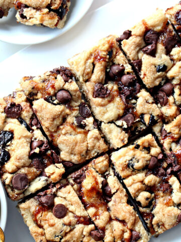Closeup of cookie bars with cherried and chocolate chips.