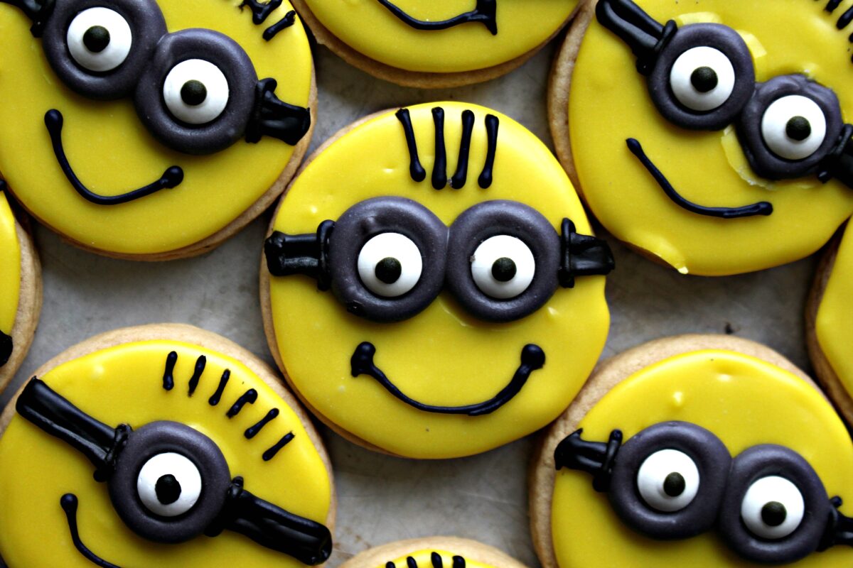 Closeup of yellow Minion Sugar Cookies.