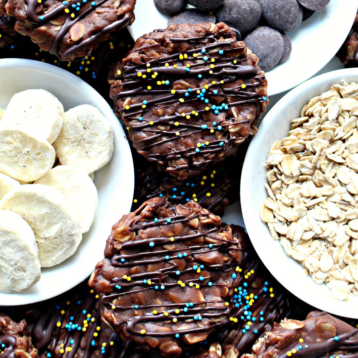 No-Bake Chocolate Peanut Butter Banana Cookies with chocolate zigzags and sprinkles.