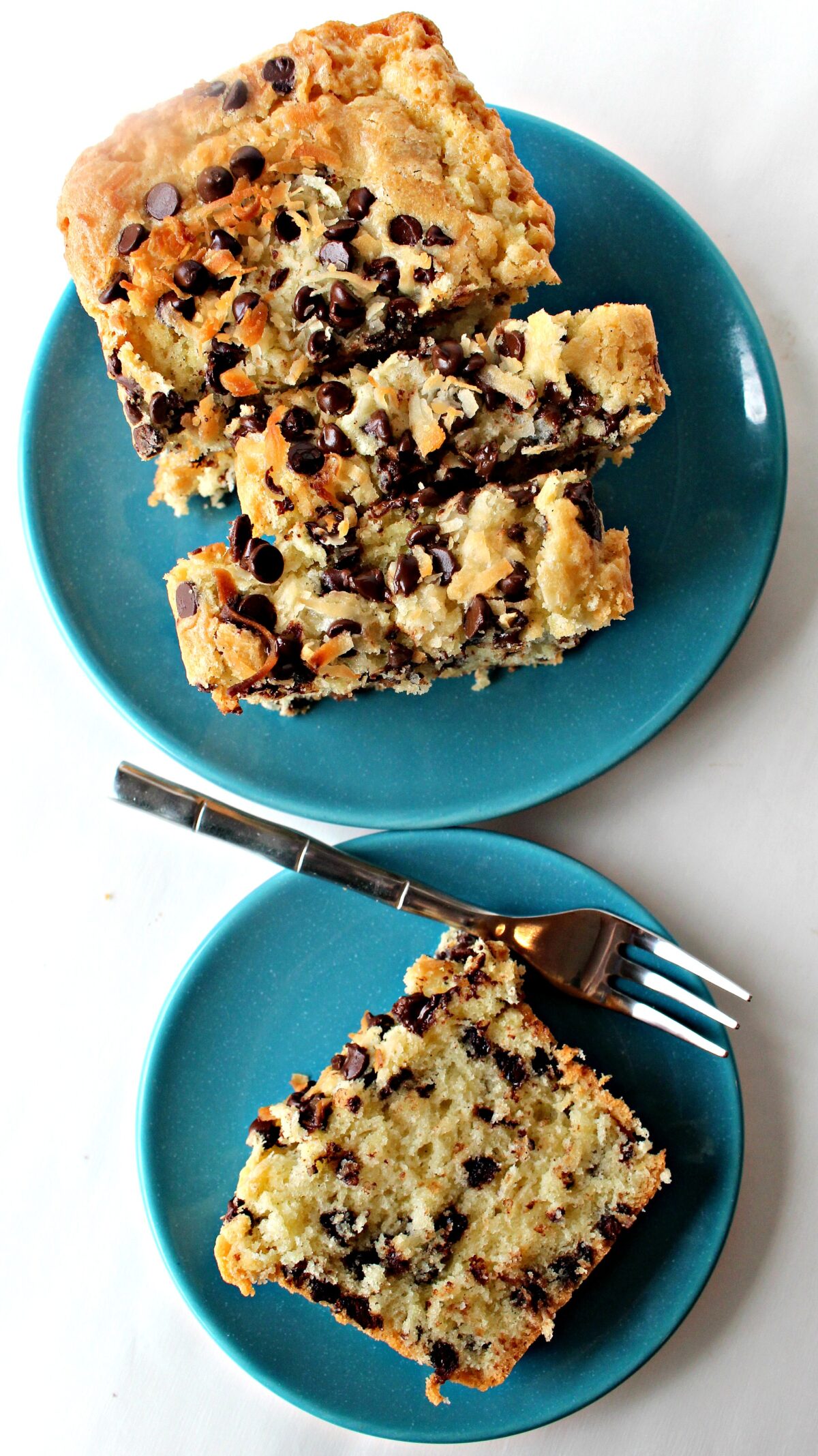 Coconut Milk  Pound Cake sliced on plates with lots of chocolate chips on top and inside.