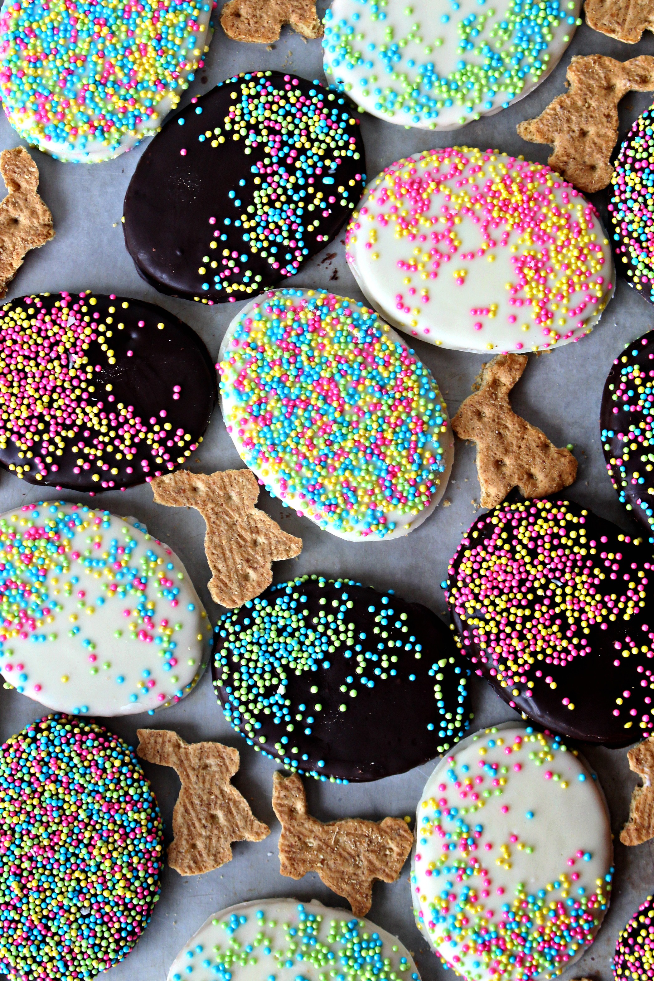 Chocolate Covered Graham Cracker Easter Eggs covered in pastel sprinkles.