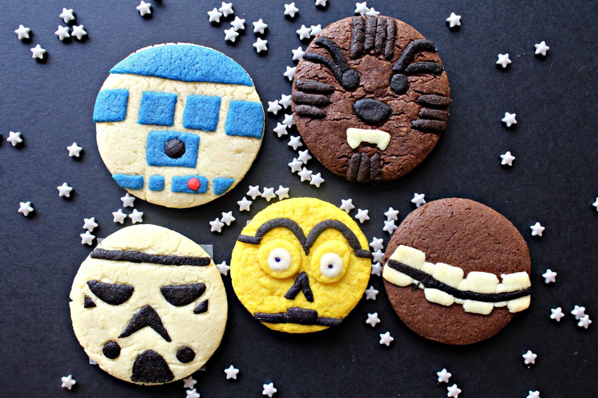 Sugar Cookies decorated like R2D2, CP3O, Wookie, Storm Trooper, and Wookie belt.