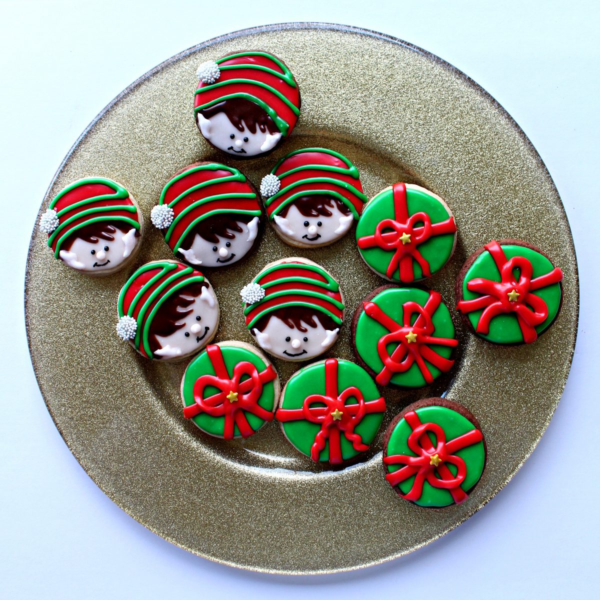 Elf on the Shelf Sugar Cookies  on a gold glass platter.