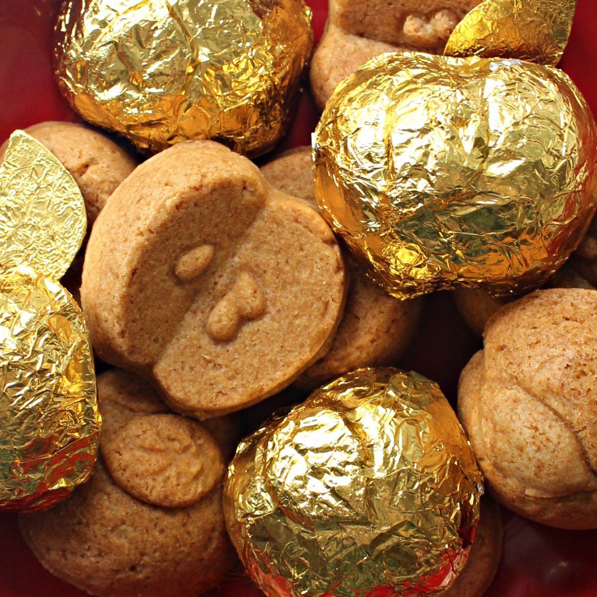 Apple Gingerbread Cakelets closeup with some covered in gold foil.