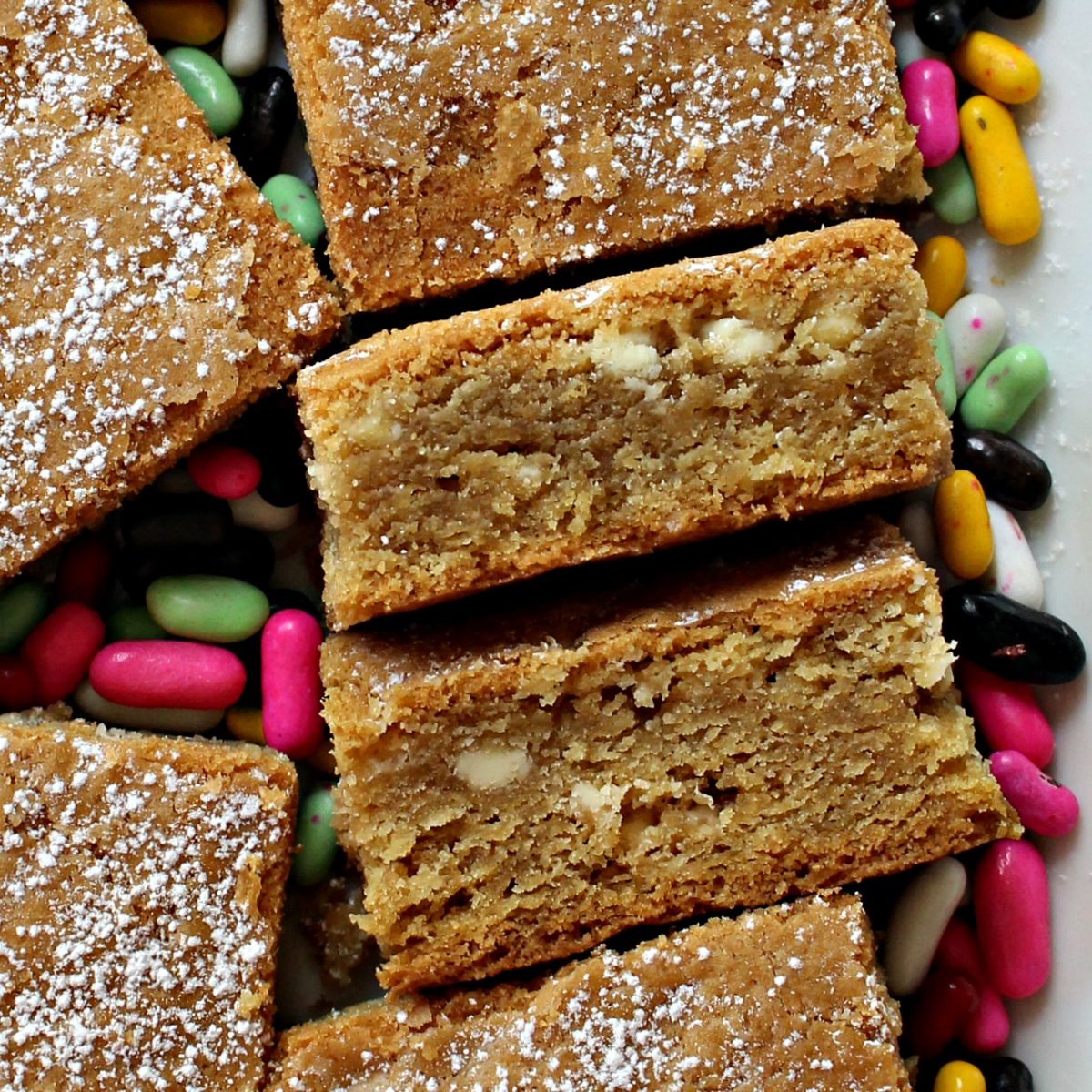 Closeup of cut edges of two thick Root Beer Float Bars.