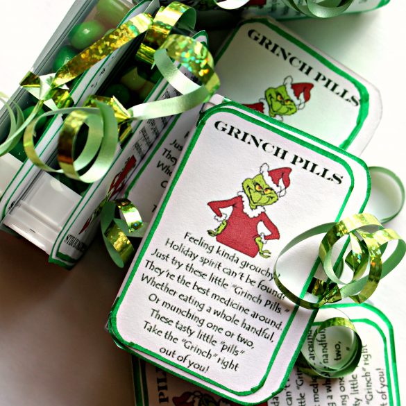 A poem describing Grinch pills glued to a TicTacs box and tied with a green ribbon.