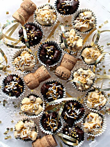 No Bake Chocolate Peanut Butter Cookies, champaign corks and gold ribbon on a white surface